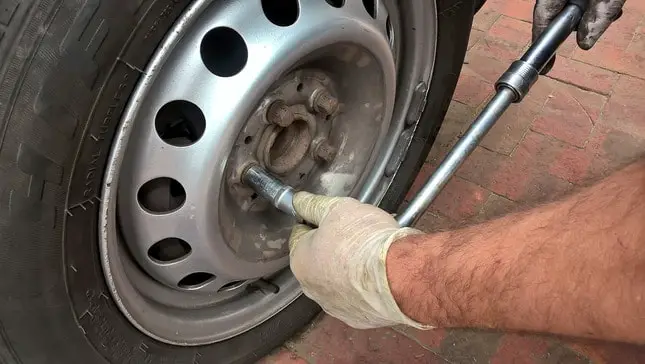 change a flat tire